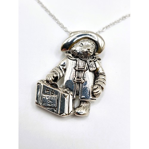 274 - A silver Paddington Bear pendant necklace. Pendant 3.5cm x 3cm, necklace 45cm. 10g