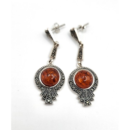 276 - A pair of marcasite and amber drop earrings, cased. 5.5cm x2cm.