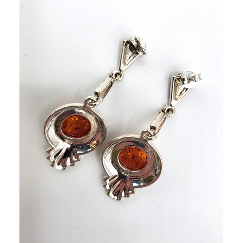 276 - A pair of marcasite and amber drop earrings, cased. 5.5cm x2cm.