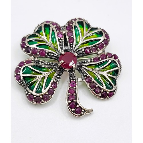 279 - A silver and plique a jour four leaf clover brooch/ pendant. Approx 3.5cm x 3.5cm 6g