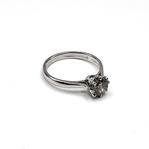 281 - An 18ct white gold solitaire ring of 3/4 of a carat (approx) 6g. Ring size M 1/2