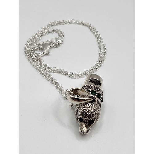 282 - A silver dog whistle (3cm x 1cm) with collar in the form of a pendant necklace (44cm) 10g