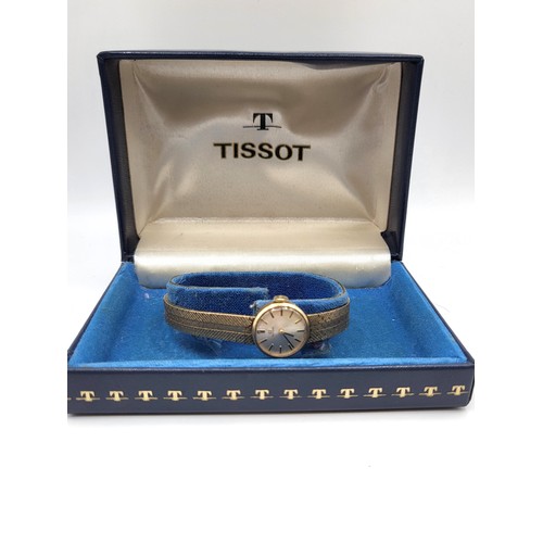 292 - Ladies 9ct gold  1960's Tissot watch in original case.