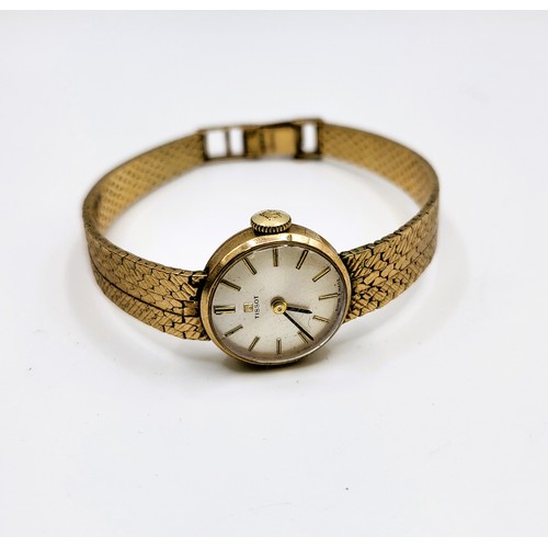 292 - Ladies 9ct gold  1960's Tissot watch in original case.