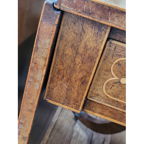 8 - A late Victorian light mahogany sofa table on a decorative four legged base with boxwood stringing a... 