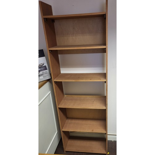 38 - A bookcase 184cm x 60cm x 22cm