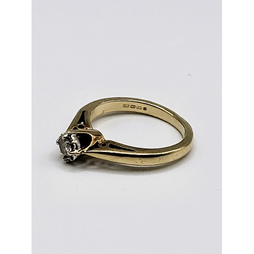 236 - A 9ct yellow gold diamond solitaire, claw set, approximately 20 point stone. 2.3gms. Size G