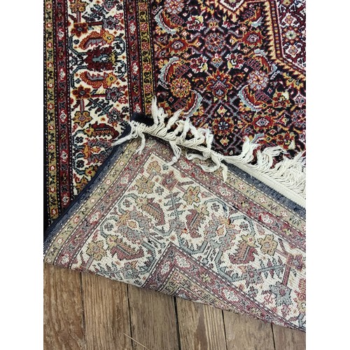 50 - A blue and red rug 205cm x 139cm