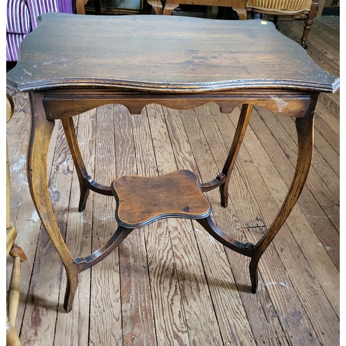 26 - An mahogany occasional table with cabriole legs. 70cm x 61cm x 43cm