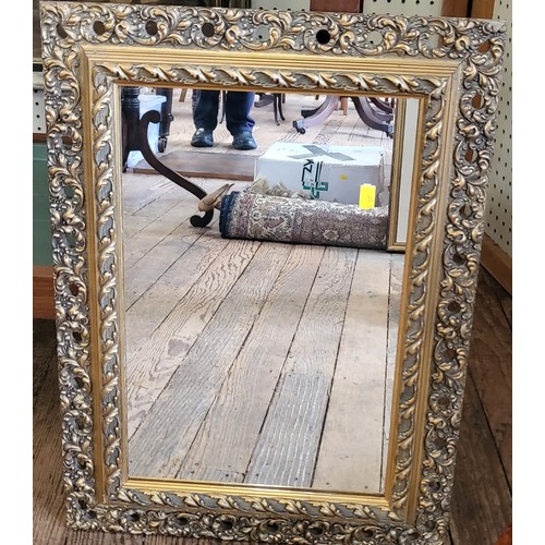 13 - A rectangular gilt framed mirror