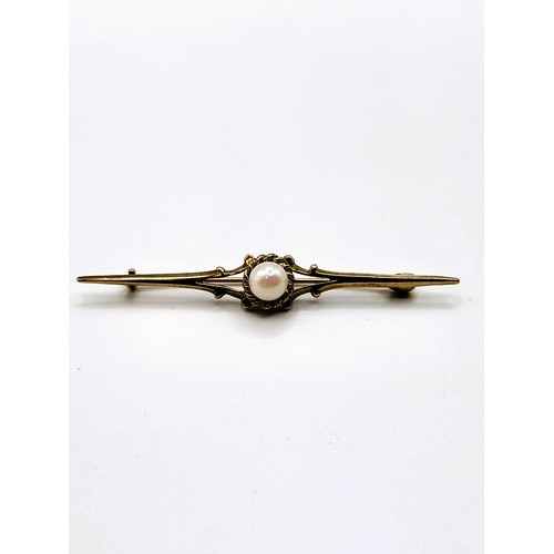 238 - Four pins including 9ct gold pin 5.2mm pearl, rose gold (unmarked) tie pin with oval cut blue paste,... 