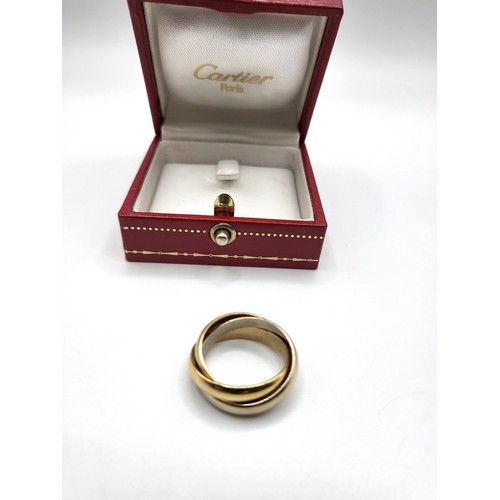 241 - An 18ct rose, white and yellow gold Russian-style wedding ring by Cartier, size L, with original Car... 