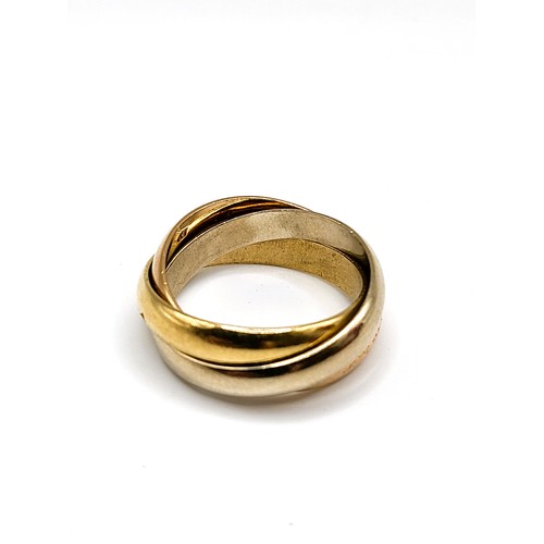 241 - An 18ct rose, white and yellow gold Russian-style wedding ring by Cartier, size L, with original Car... 