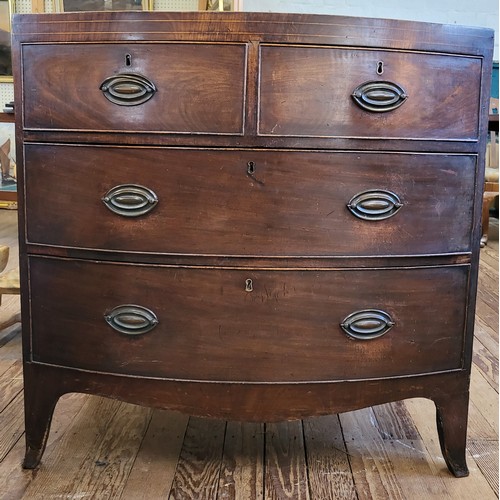 18 - A bow front  chest of two short over two long drawers 89cm x 89cm x 49cm