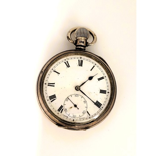 294 - A Swiss made silver pocket watch, presented in 1936.