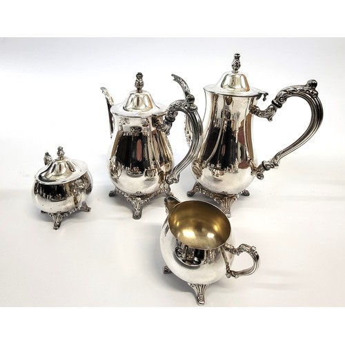 197 - A pair of candelabra and a collection of silver plate