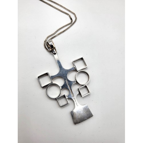 246 - A David-Andersen Norwegian silver Modernist pendant on a silver curb link chain, 42cm/ 16