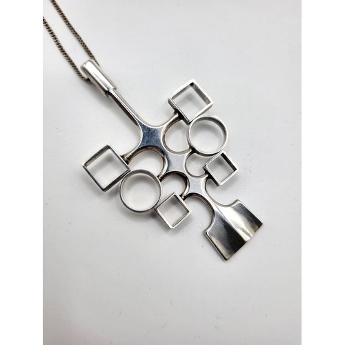 246 - A David-Andersen Norwegian silver Modernist pendant on a silver curb link chain, 42cm/ 16