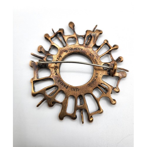 248 - An Uni David-Andersen bronze designer brooch in the shape of a snowflake 5cm, 10.7gms