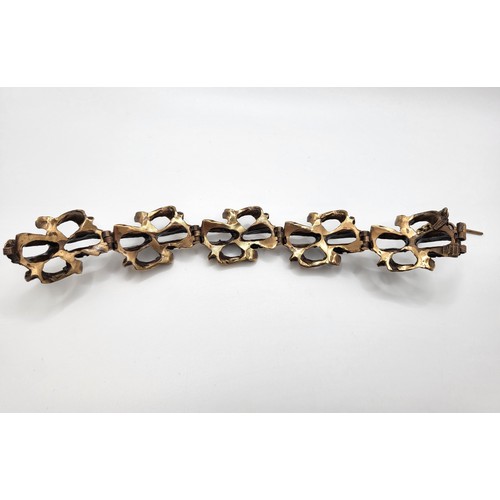 249 - A Norwegian bronze design bracelet by Knut, 52.4gms and snowflake pendant (5cm/ 2