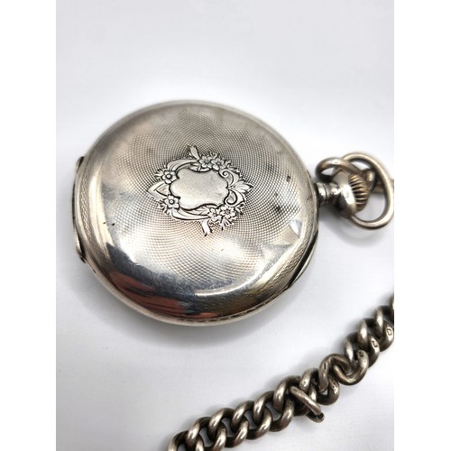 296 - A Hunter fob watch inscribed and Albert chain in silver with T bar London , Churchill coin 1836, and... 