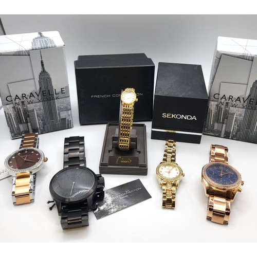 298 - A collection of five watches to include two Caravelle New York, dress watches unworn and in original... 