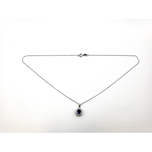 266 - An 18ct white gold sapphire and diamond pendant necklace 41cm trace link chain 1ct approx 2.1gms