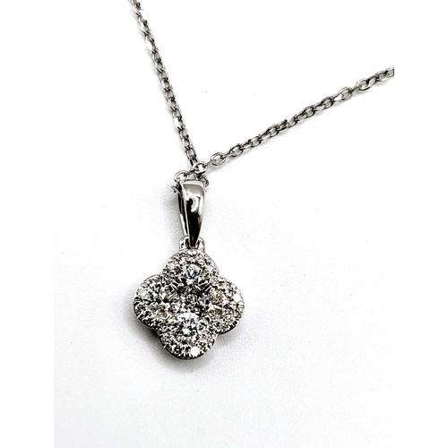 276 - An 18ct white gold multi-diamond clover leaf style pendant trace link chain 41cm 2.2gms