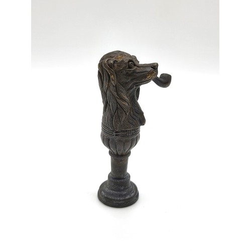 93 - A bronze document seal in the form of a dog with a pipe. 6.5cm 32.1gms