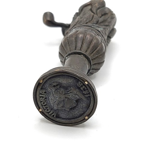 93 - A bronze document seal in the form of a dog with a pipe. 6.5cm 32.1gms