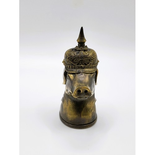 94 - A brass vesta case in the form of a pig in a German Pickelhaube 7cm x 3.5cm. 72gms. 1915 Ypres trenc... 