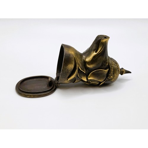 94 - A brass vesta case in the form of a pig in a German Pickelhaube 7cm x 3.5cm. 72gms. 1915 Ypres trenc... 