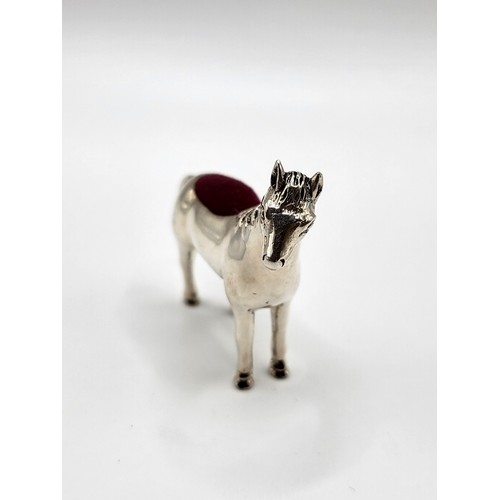 208 - A silver horse pin cushion stamped 925  4cm x 4cm. 18.6gms