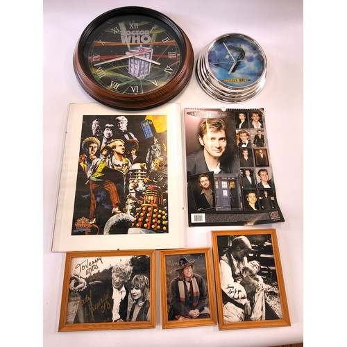 144 - Two Dr Who clocks (one with a wooden frame, the other with a chrome frame), A David Tennant calendar... 