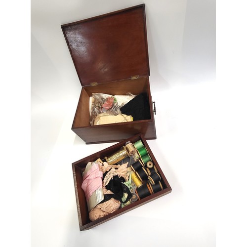 19 - A wooden sewing box complete with vintage cotton reels, lace and accessories.