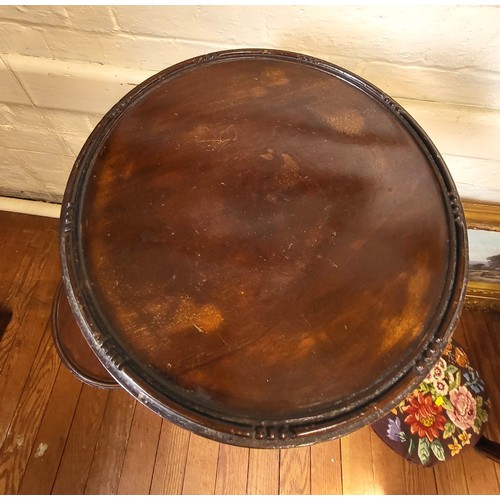 20 - A wine table 62cm x 28cm diameter and a mahogany jardiniere stand 109cm x 30cm