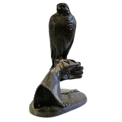 119 - Jeanne Rynhart (1946-2020) bronze resin Falcon on a glove sculpture. Signed  E/250. Size 63cm x 33cm... 