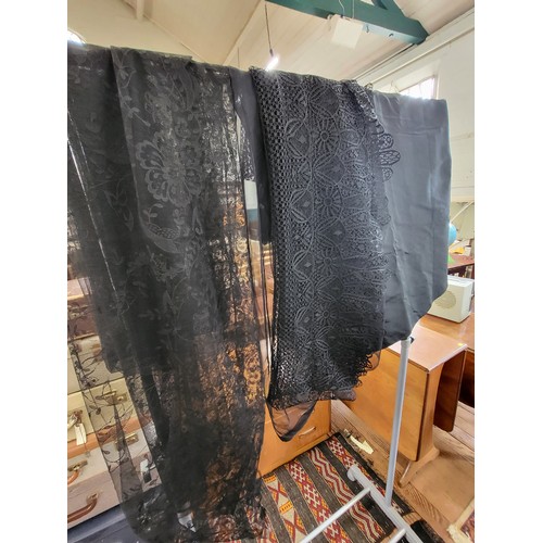 135 - Victorian black lace mourning wear comprising of a black shawl/scarf, a black lace scarf and a lined... 