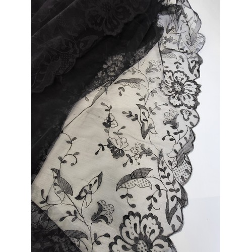 135 - Victorian black lace mourning wear comprising of a black shawl/scarf, a black lace scarf and a lined... 