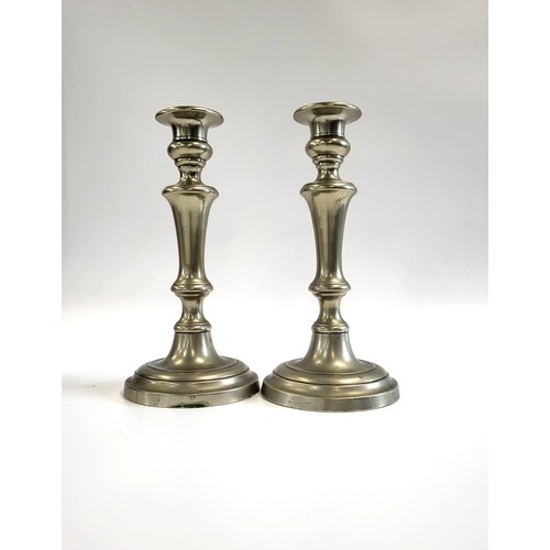 122 - A pair of tutenag/ paktong candlesticks