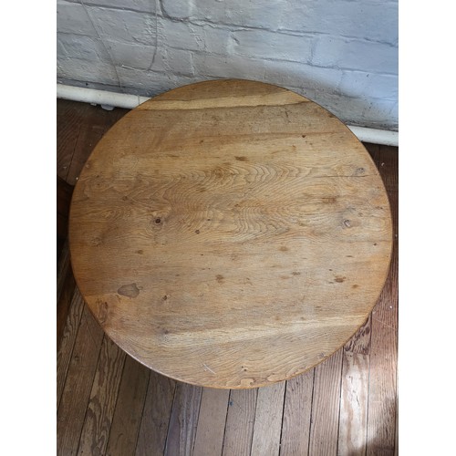 42 - A teak mid-century Arts & Crafts coffee table by Brian Griffiths and signed. 40cm x 80cm.