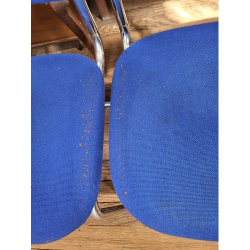 44 - Four 1970 chrome dining chairs with blue cloth covers. Some parcel tape residue on seats.