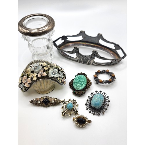 405 - A selection of six costume brooches, a glass vase with silver (unmarked) rim, a floral basket with m... 