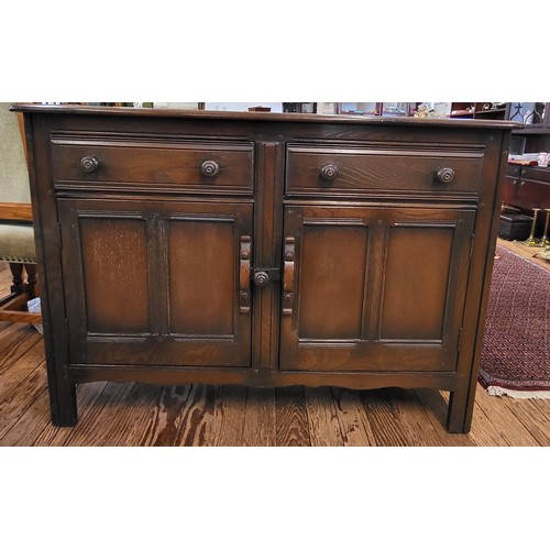 47 - Dark oak sideboard, possibly Ercol 84cm x 125cm x 48cm