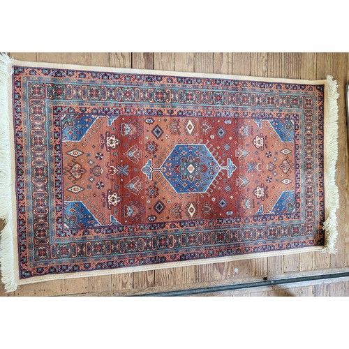 86 - A pure wool rug 140cm x 82cm