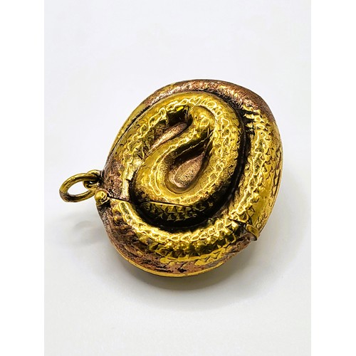 130 - A brass coiled snake vesta case 2.5cm x 4.5cm x 3.5m. 17.7gms.