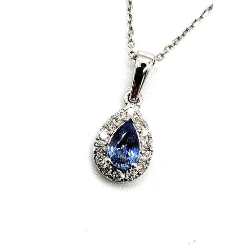 413 - An 18ct white gold pear shaped sapphire (less than 0.50 carat) and diamond pendant 1cm drop necklace... 