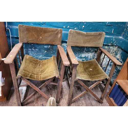 60 - Two folding directors chairs with olive/brown velvet back and seat.