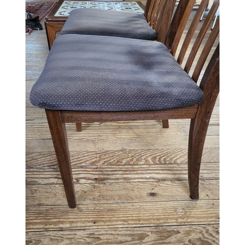 27 - Four 'G-Plan Fresco' high back dining chairs in teak with railed backs, brown upholstered seats and ... 