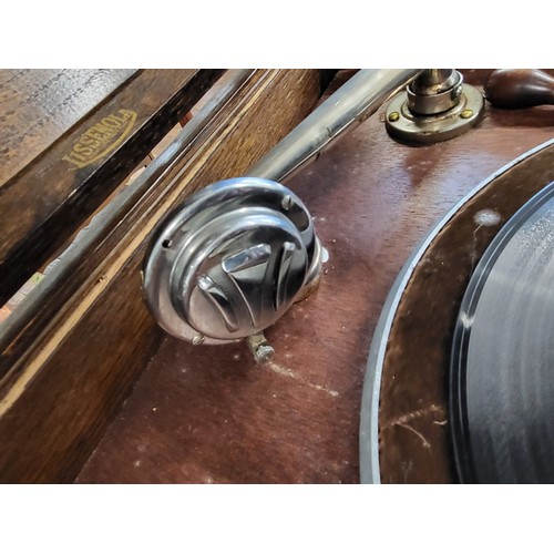 29 - A vintage oak cased clockwork Lissenola gramophone unit 85cm x 44cm x 49cm. Lift top to reveal the g... 